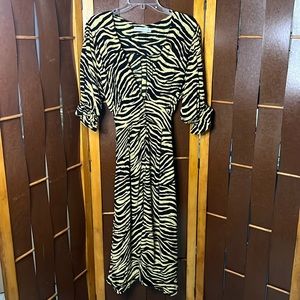 Faithful the Brand tiger print midi dress.